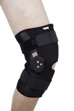 Пов'язка на колінний суглоб зі спеціальними шарнірами для регулювання кута згинання ЕS-797